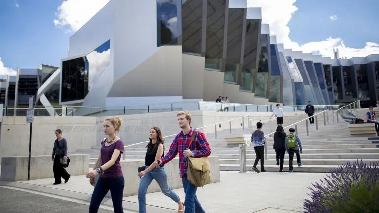 Students walking near JCSMR building