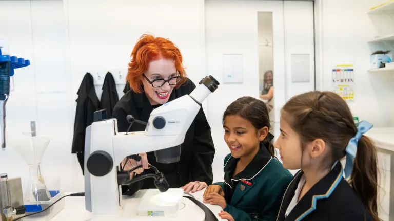 professor with students in a lab