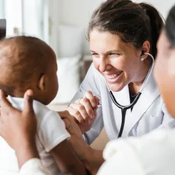A doctor checking a child's health