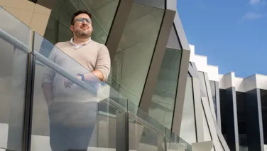 Man in front of a building